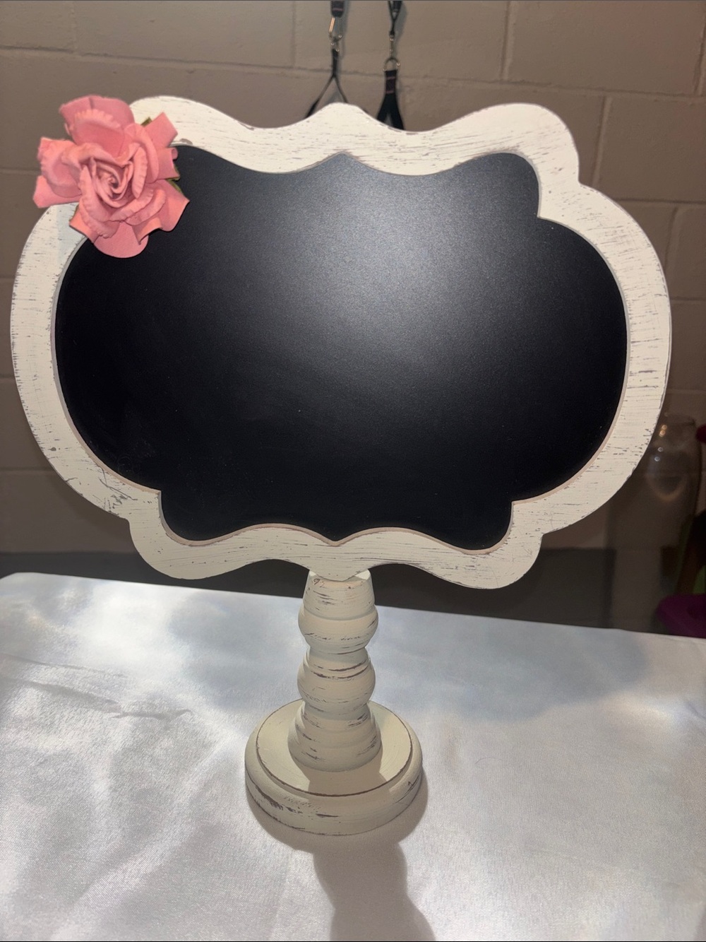 White Distressed Pedestal Chalkboard Sign with Pink Rose Accent